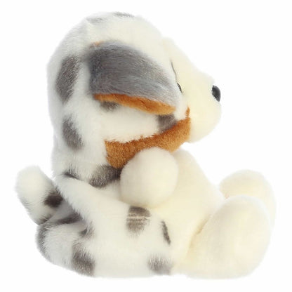 The right side view of the sitting Aurora Palm Pals Australian Shepherd plush highlighting its spotted merle coat profile.
