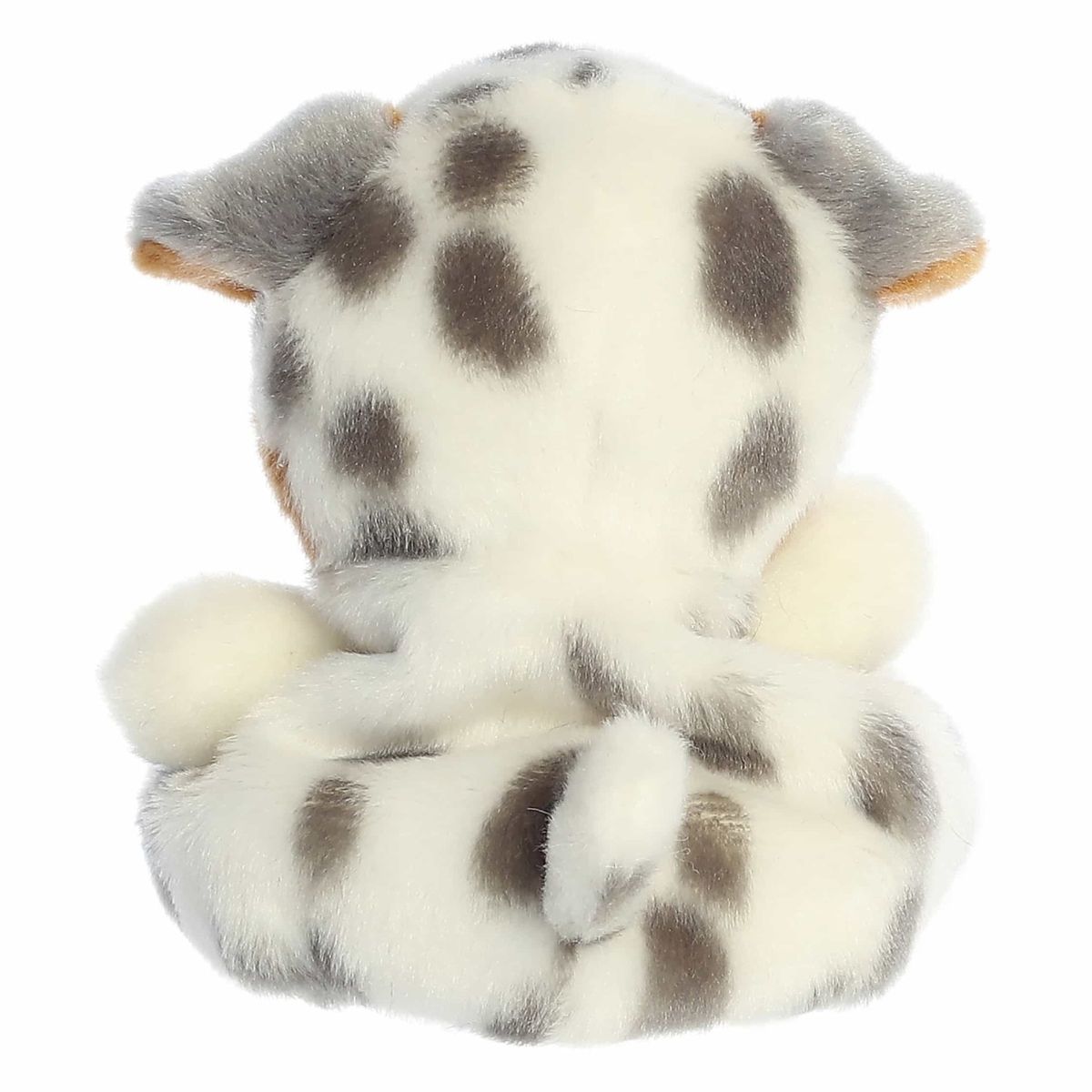 The rear view of the spotted Aurora Aussie puppy stuffed animal displaying its beautifully patterned back fur and tiny tail.