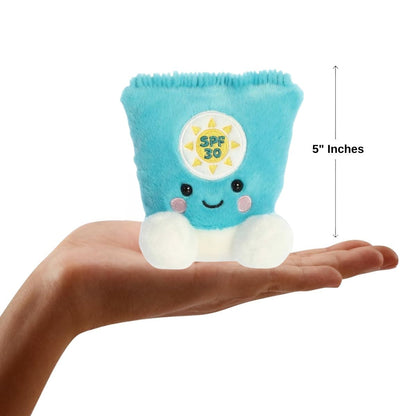 Front view of the mini sunscreen plush sitting balanced on a human hand with a dimension line indicating its 5-inch height.