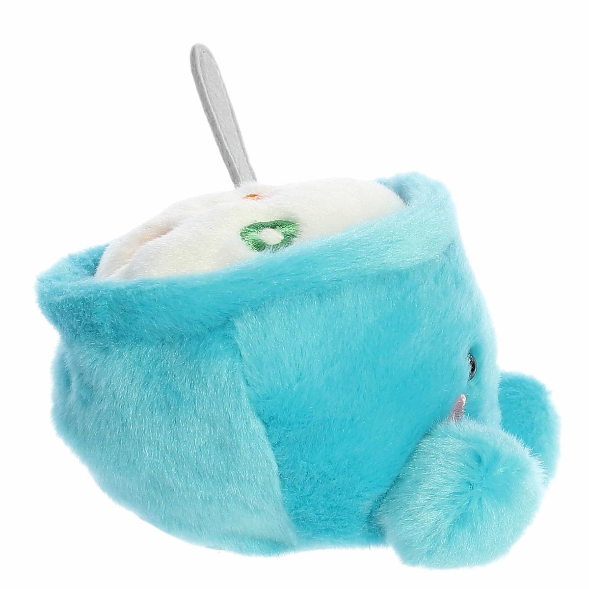 Left side profile view of the blue cereal bowl plush showing its rounded dish silhouette and upright fabric spoon handle.