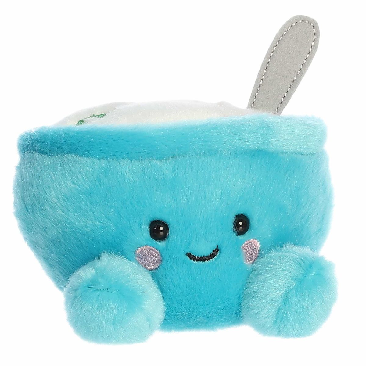 Three-quarter view of the Aurora Palm Pals Trixie Breakfast Cereal 5-inch plush sitting upright, featuring a turquoise-blue bowl and a grey spoon.