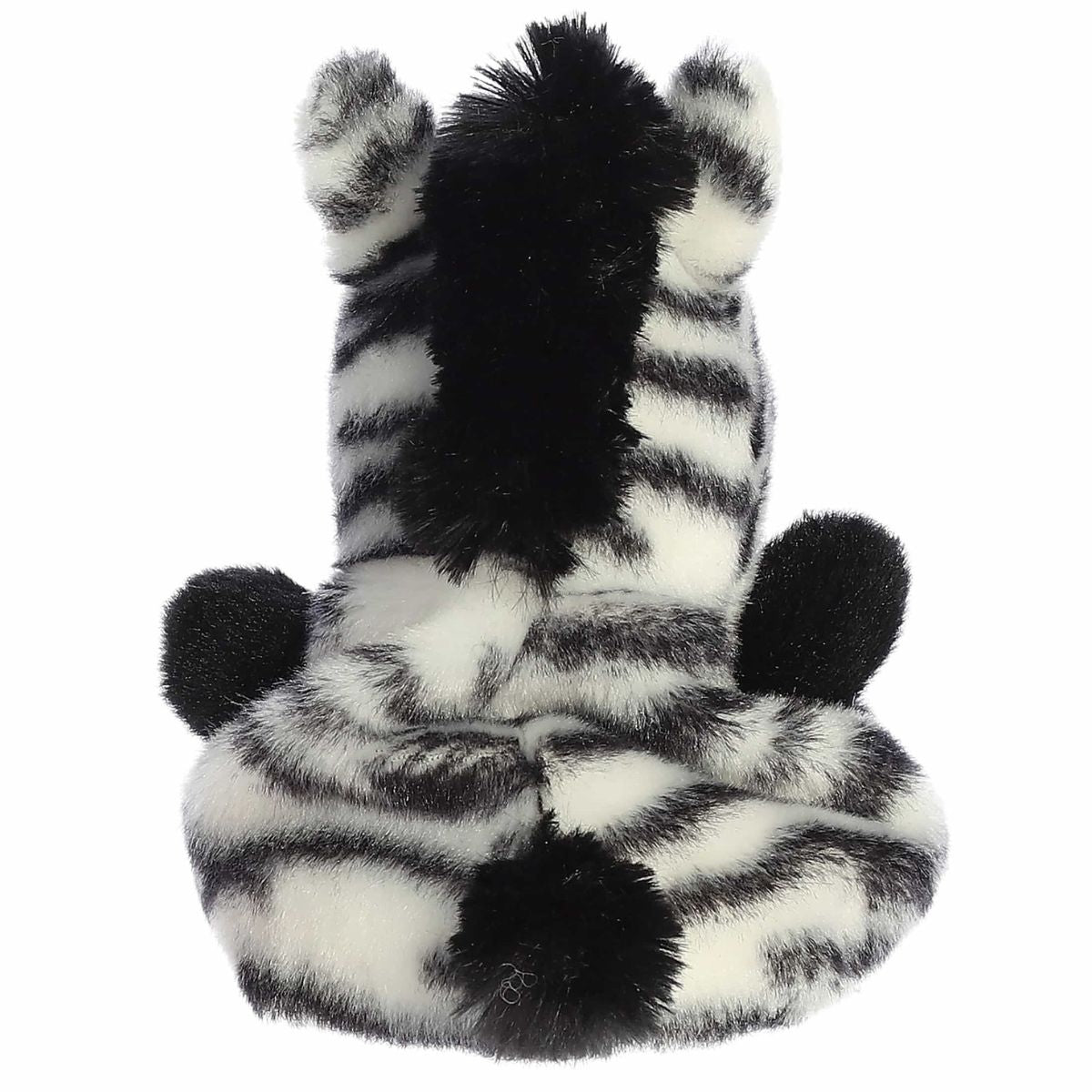 The rear view of the striped Aurora zebra stuffed animal displaying its plush black mane and small tufted tail.