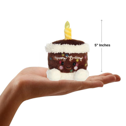 The miniature Choco B'Day Birthday Cake plush resting in an open human hand under a 5-inch height graphic indicator.