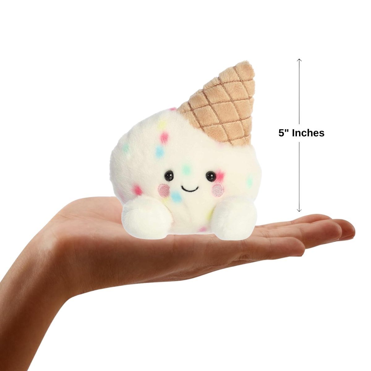 Dimension graphic showing the 5-inch Aurora Palm Pals Sprinkle Ice Cream resting comfortably in a person's hand.