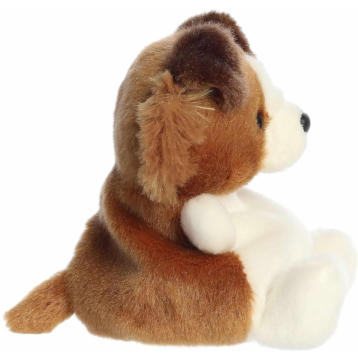 The right side profile thumbnail of the sitting brown and white puppy plush highlighting its tiny tail and fluffy mane layout.