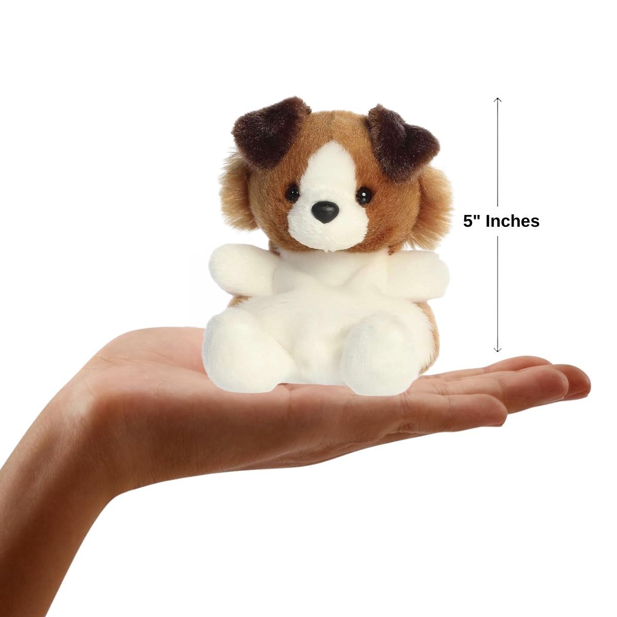 The miniature Fia Sheltie plush sitting inside an open human hand under a 5-inch height graphic indicator.