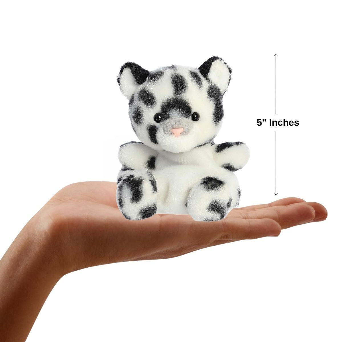 Dimension graphic showing the 5-inch Aurora Palm Pals Kaia Snow Leopard resting comfortably in a person's hand.