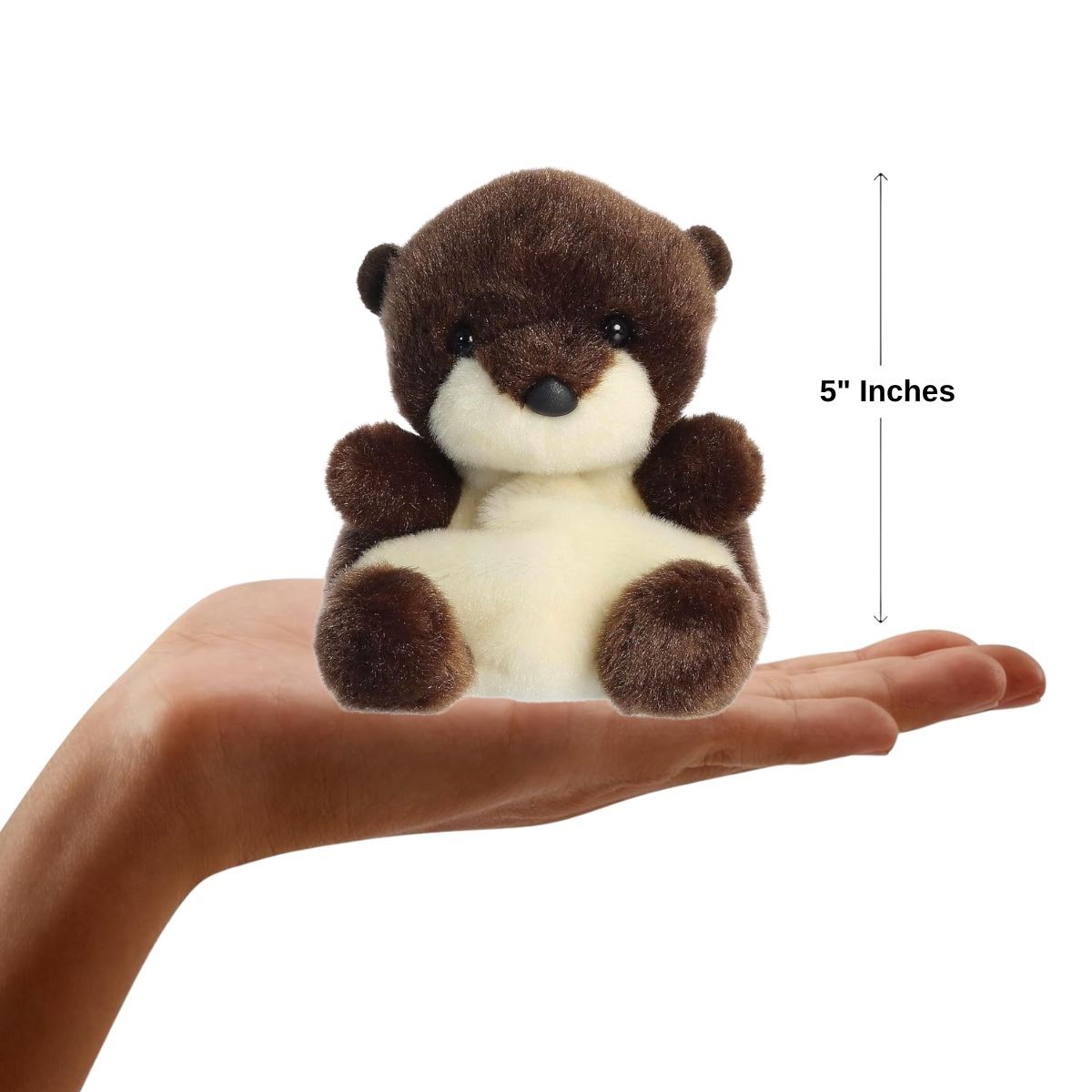 Dimension graphic showing the 5-inch Aurora Palm Pals Elena River Otter resting comfortably in a person's hand.