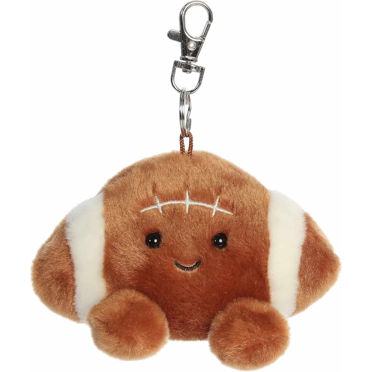 Straight-on front view of the 4-inch Aurora Palm Pals Tackle Football brown clip-on plush featuring a smiling face.