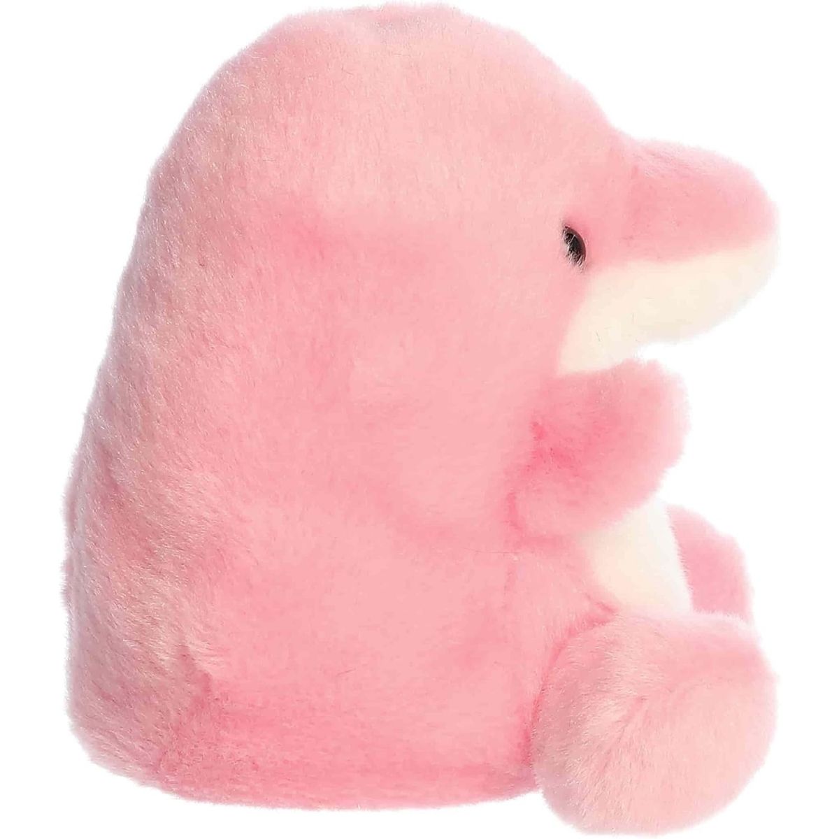 Side profile view of the Palm Pals Pink Dolphin plush highlighting its perfectly squishy round body, pink dorsal fin, and prominent snout.