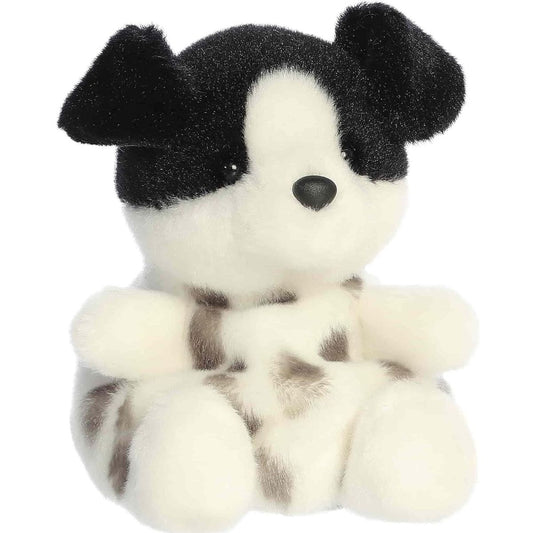 Front angled view of the 5-inch Aurora Palm Pals Snorkels Dog plush toy featuring a black and white spotted body and floppy black ears.