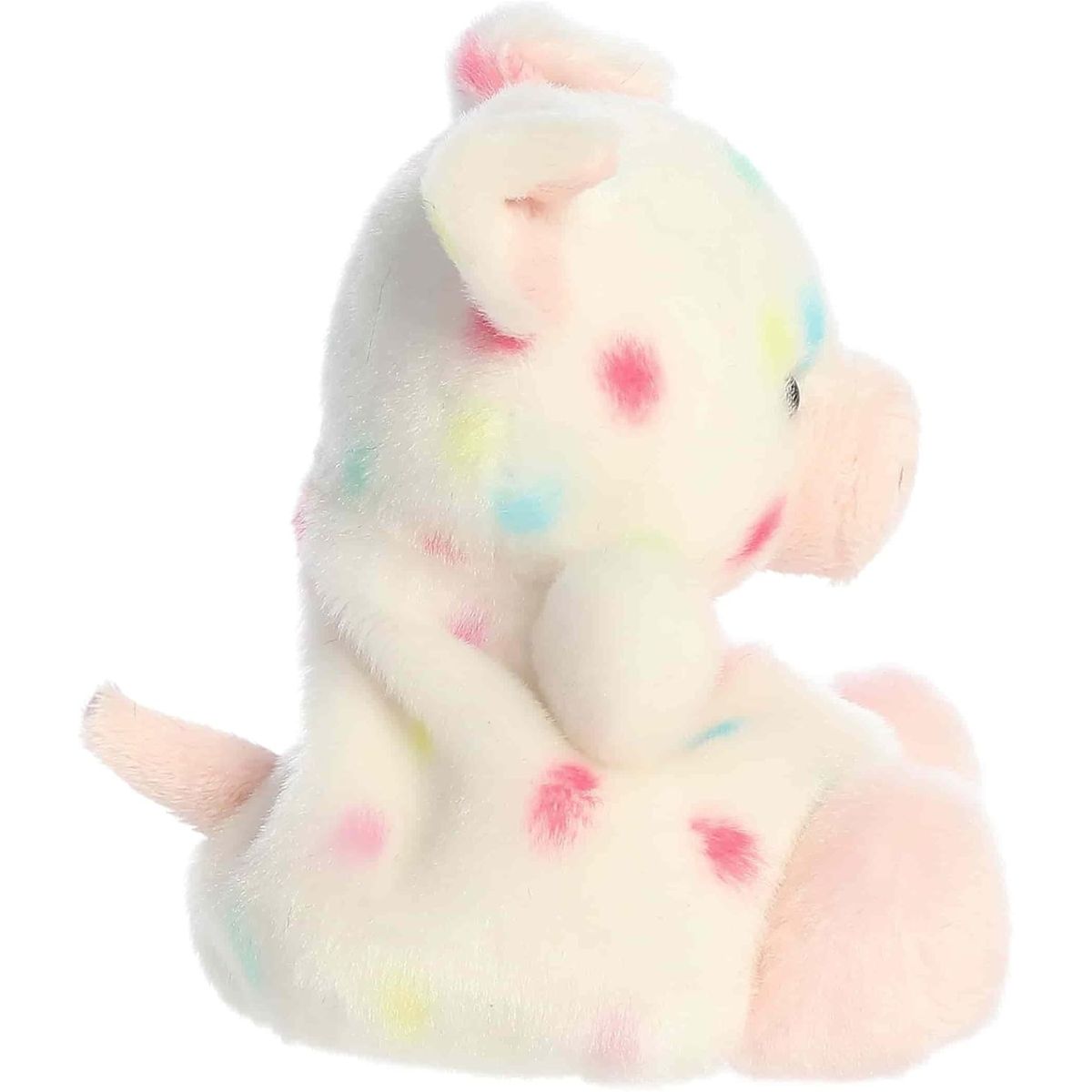 Side profile view of the Palm Pals Patsy Pig highlighting its plump shape, colorful spots, and tiny tail.