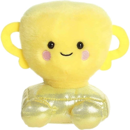 Straight front sitting view of the yellow trophy plush showing its two side handles, rosy cheeks, and shiny gold feet.