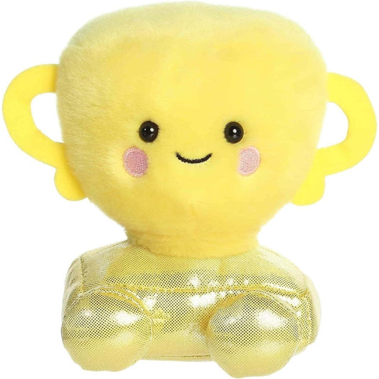 Straight front sitting view of the yellow trophy plush showing its two side handles, rosy cheeks, and shiny gold feet.
