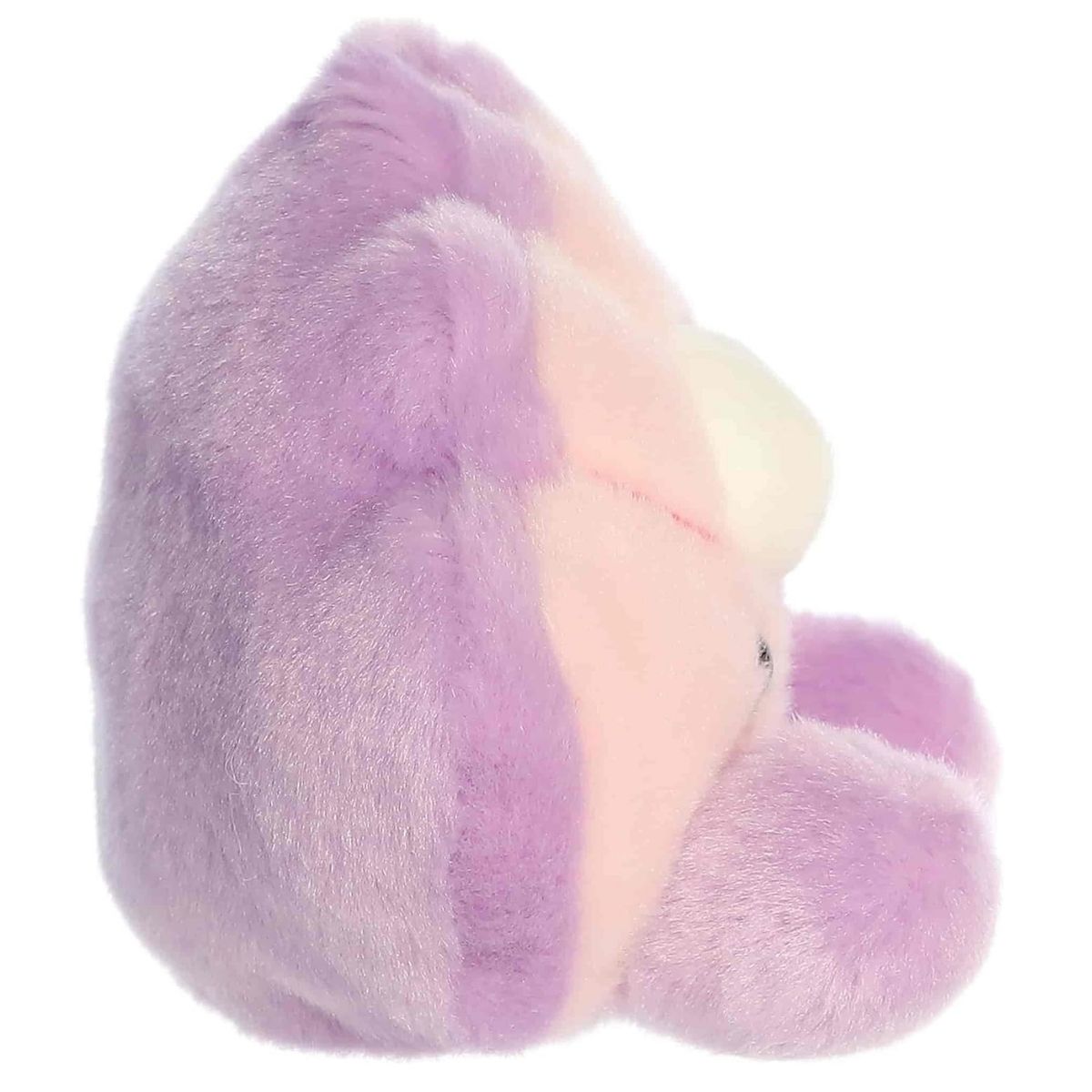 Side profile view of the Aurora Palm Pals Odette Oyster highlighting its plump shell shape and white pearl.