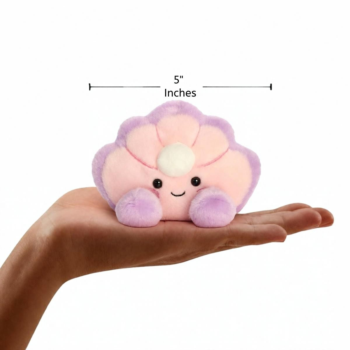 Dimension graphic showing the 5-inch Aurora Palm Pals Odette Oyster resting comfortably in a person's hand.