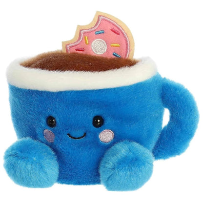 Slightly angled view of the cheerful Palm Pals Tariq Coffee & Donut plush sitting upright.