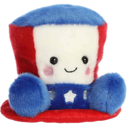 Angled front view of the soft red, white, and blue Palm Pals Americana hat stuffed toy.
