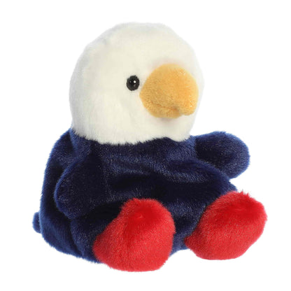 Slightly angled side view of the Aurora Palm Pals Patriot Eagle plush highlighting its yellow beak and round shape.