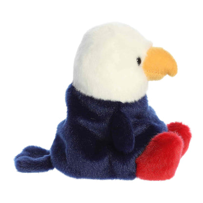 Side profile of the cuddly Palm Pals bald eagle stuffed animal showing its tail and beak.