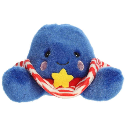 Straight front sitting view of the blue cowboy hat plush showing its red and white striped brim, rosy cheeks, and plush little blue feet.