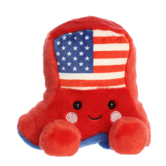 Front view of the 5-inch Aurora Palm Pals Stripes Cowboy Boot plush toy featuring a red body, American flag pattern, and sweet kawaii face.