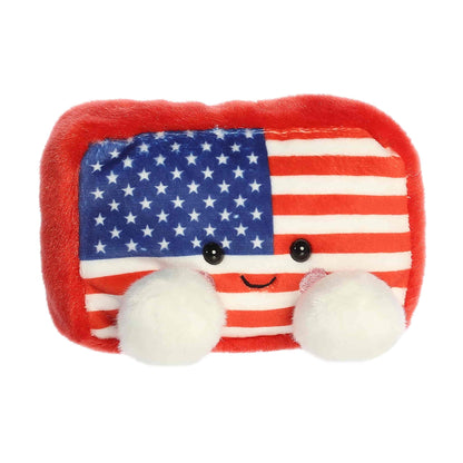 Angled front view of the 5-inch Aurora Palm Pals Indivisible Flag plush toy featuring stars, stripes, and white feet.