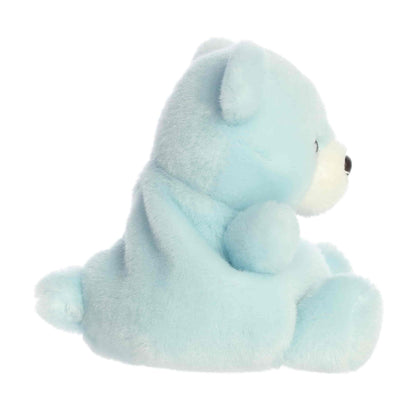 Side profile view of the Palm Pals Benny Bear highlighting its plump shape and tiny plush tail.