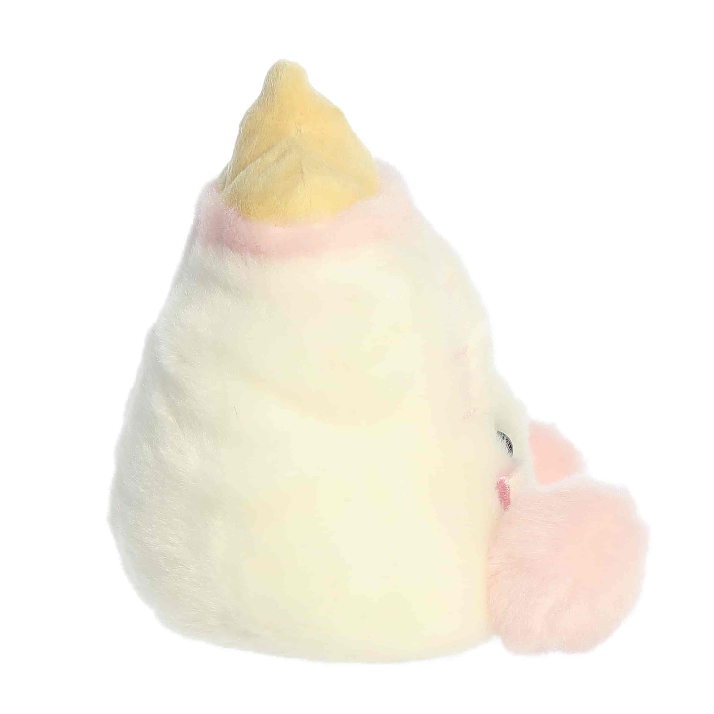 Side profile of the Aurora Palm Pals Thea Baby Bottle plush highlighting its round shape.