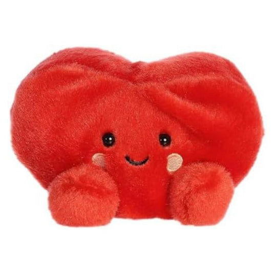 Straight-on front view of the soft red Palm Pals heart plush featuring a happy smiling face and rosy cheeks.