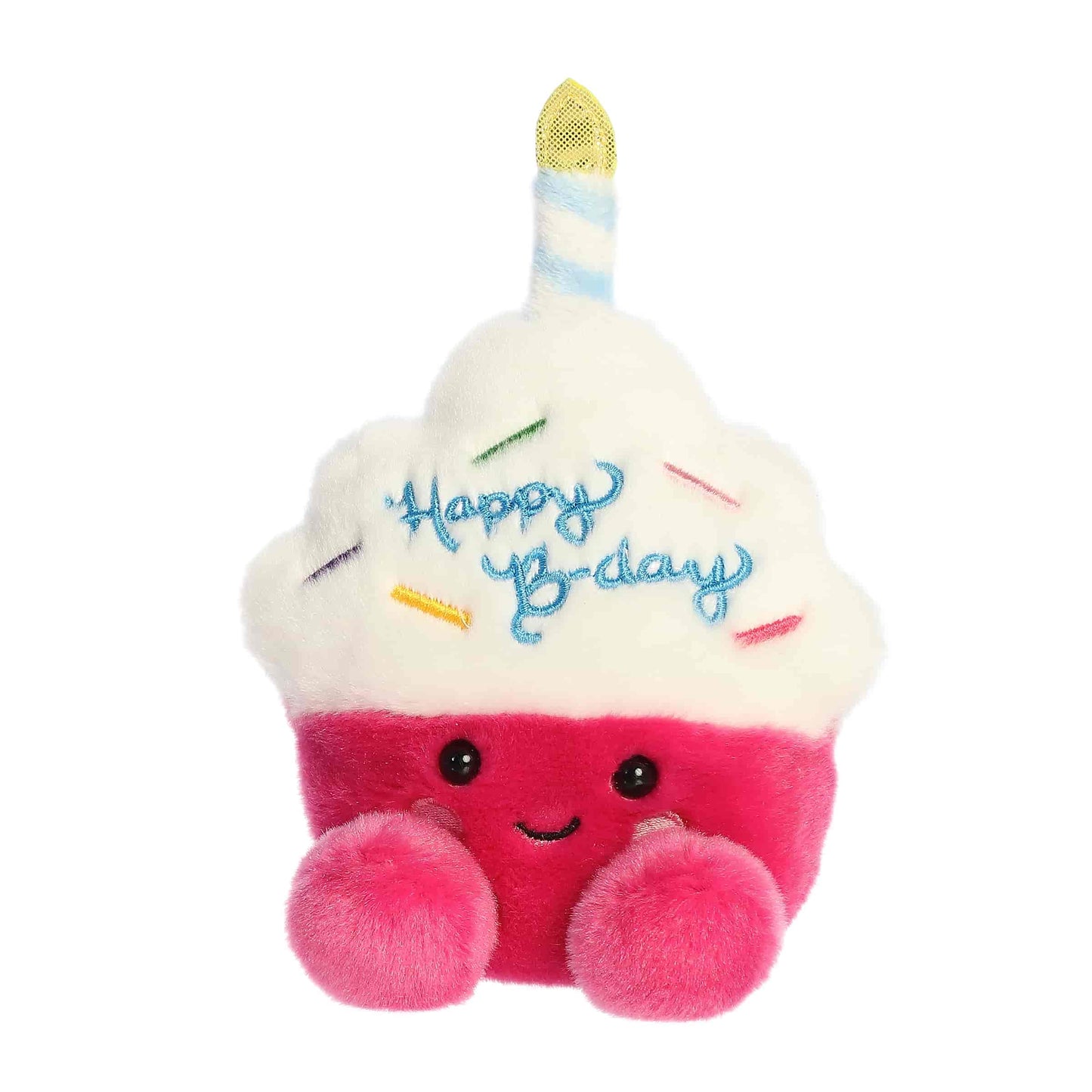 Slightly angled view of the 5-inch Aurora Palm Pals Sparkle Birthday Cupcake pink and white plush toy with a candle on top.