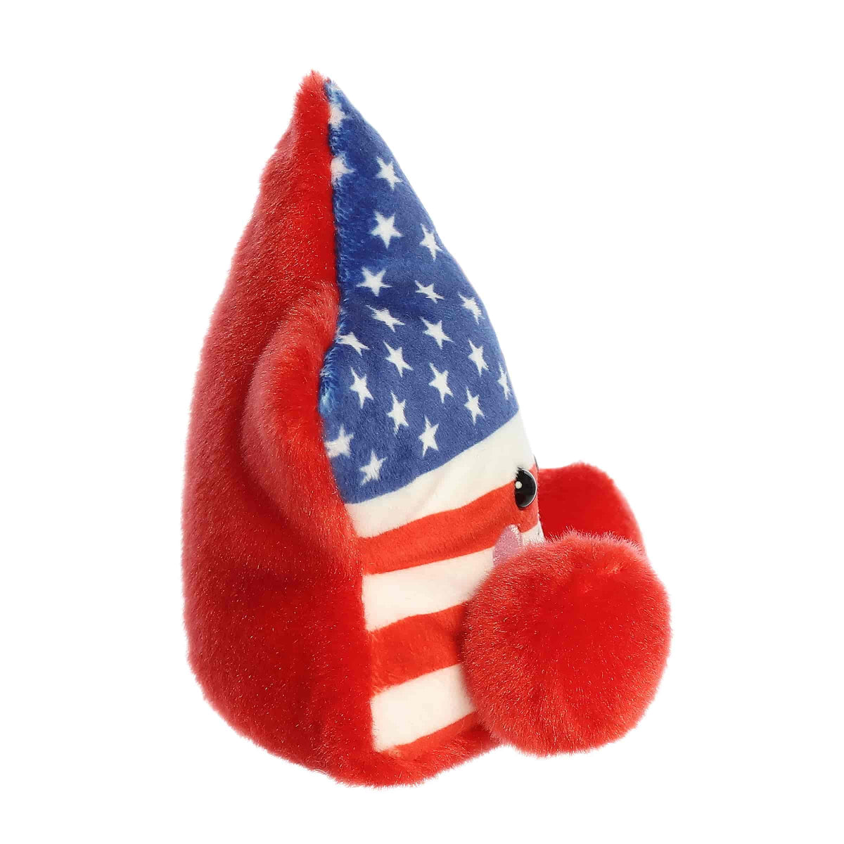 Side profile view of the Americana Star highlighting its plump shape and solid red plush back.