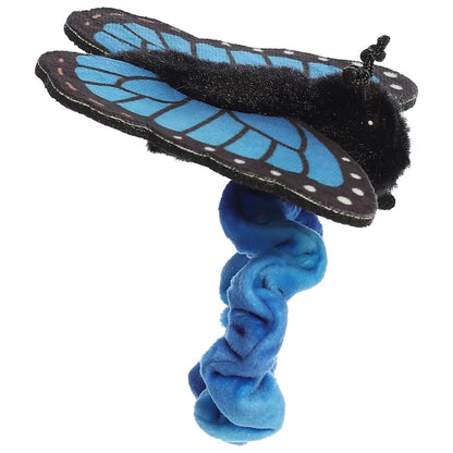 Blue butterfly-shaped toy with a curly tail on a white background