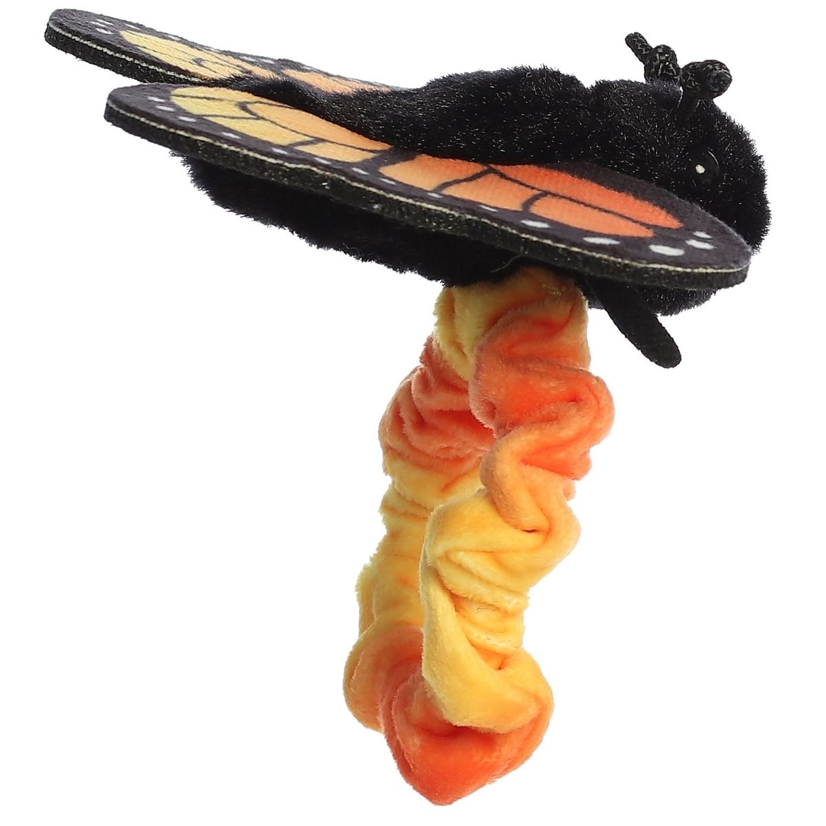 Plush toy shaped like a butterfly with a caterpillar body on a white background