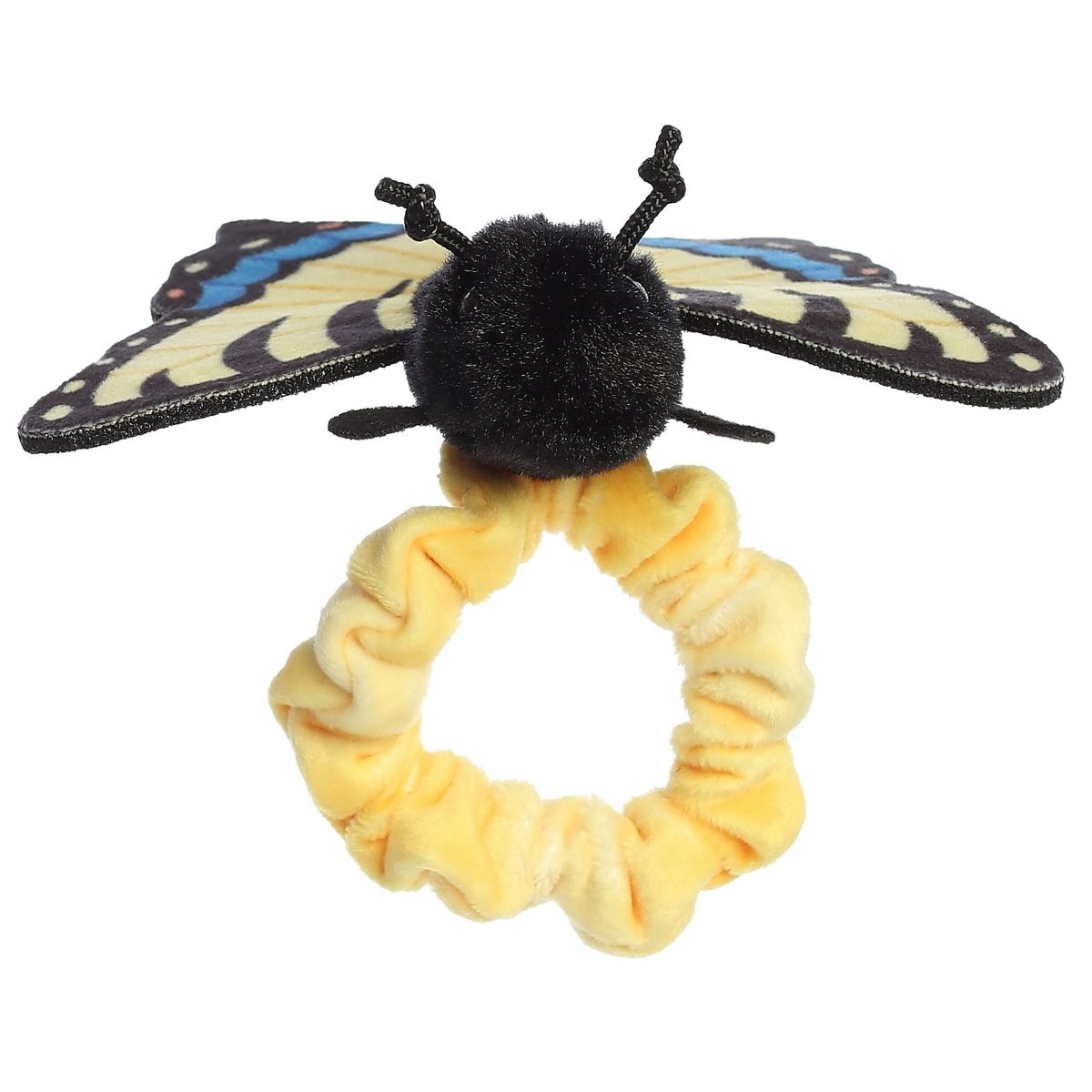 Front view of the butterfly's sweet face sitting atop the stretchy yellow plush wristband.