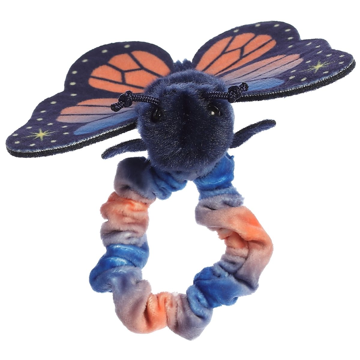 Angled view of the Sunset Butterfly plush showing its cute face, little antennae, and star-speckled wings.