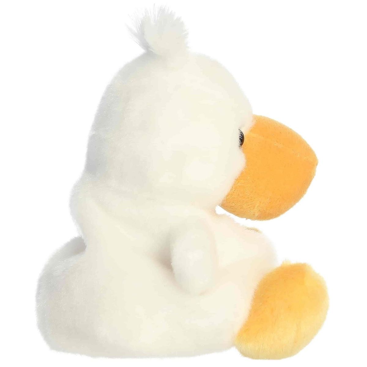 Side profile view of the Palm Pals pelican stuffed animal showing his fluffy tail and the shape of his orange beak.