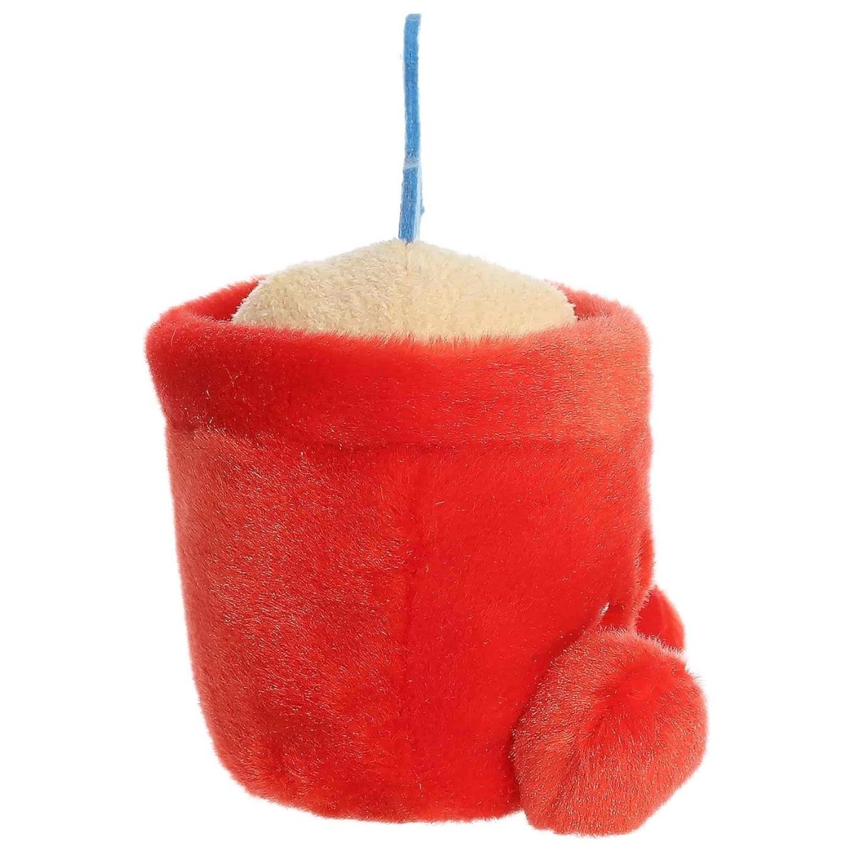 Side profile view of the Palm Pals sand bucket stuffed animal showing the shape of the bucket and the flat handle of the shovel.
