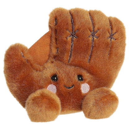 Front view of the Aurora Palm Pals Tag Baseball Glove stuffed toy showing brown fabric, stitched webbing, rosy cheeks, and a smiling face.