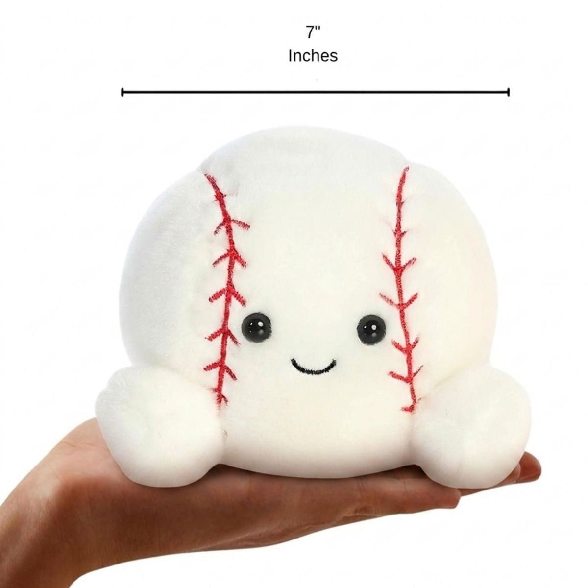 The enlarged 7-inch Slugger Baseball plush sitting balanced in an open human hand under a 7-inch height graphic indicator.