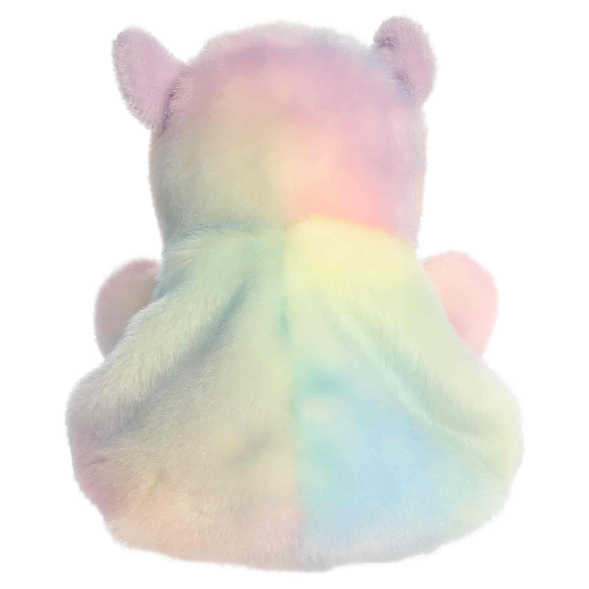 Back view of Aurora Palm Pals Seb Sorbet Capybara plush highlighting soft rainbow pastel plush and lavender ears.