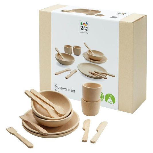 The eco-friendly PlanToys wooden tableware set displayed next to its sustainable cardboard packaging.