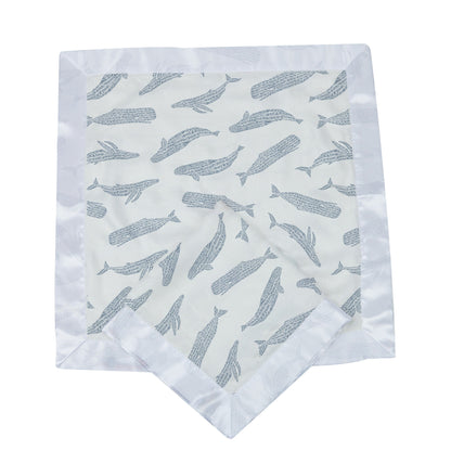 A single Blue Shadow Whales bamboo security blanket folded to show the whale print and white satin border.