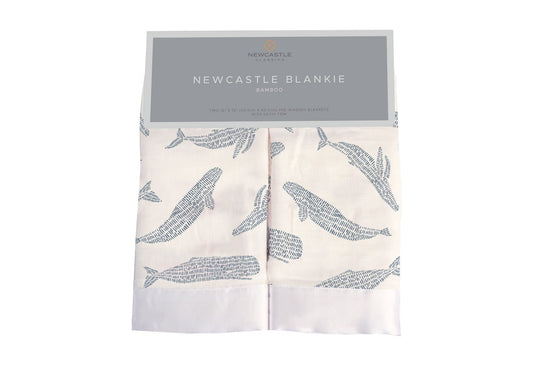 Packaging for Newcastle Classics Bamboo Blankie two-pack in Blue Shadow Whales print with satin trim.