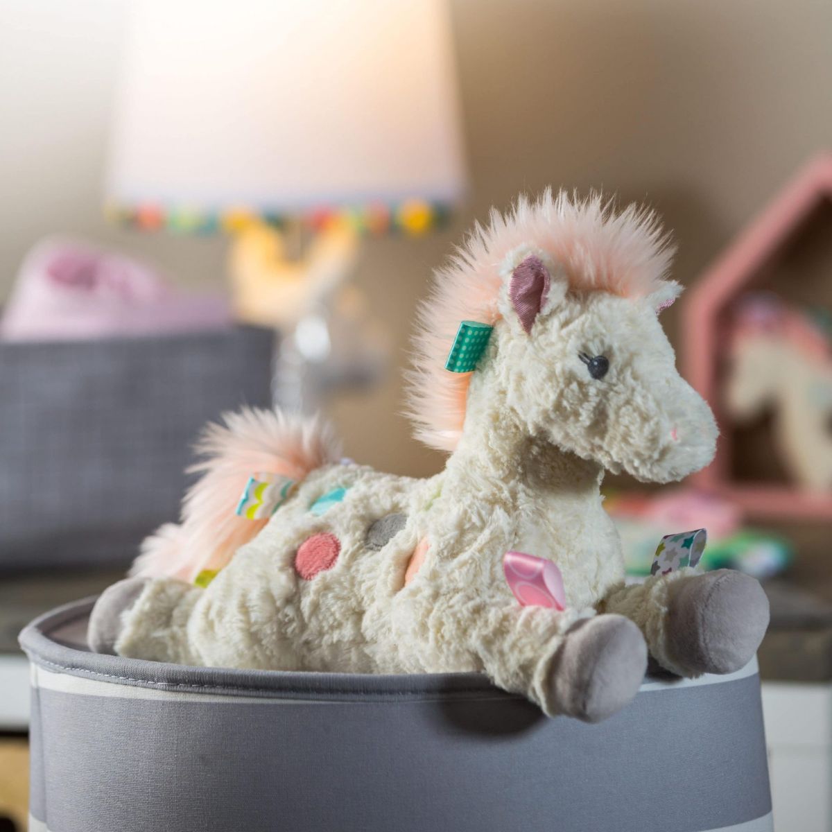 Close up of the sweet embroidered face and safe construction of the Mary Meyer pony toy.