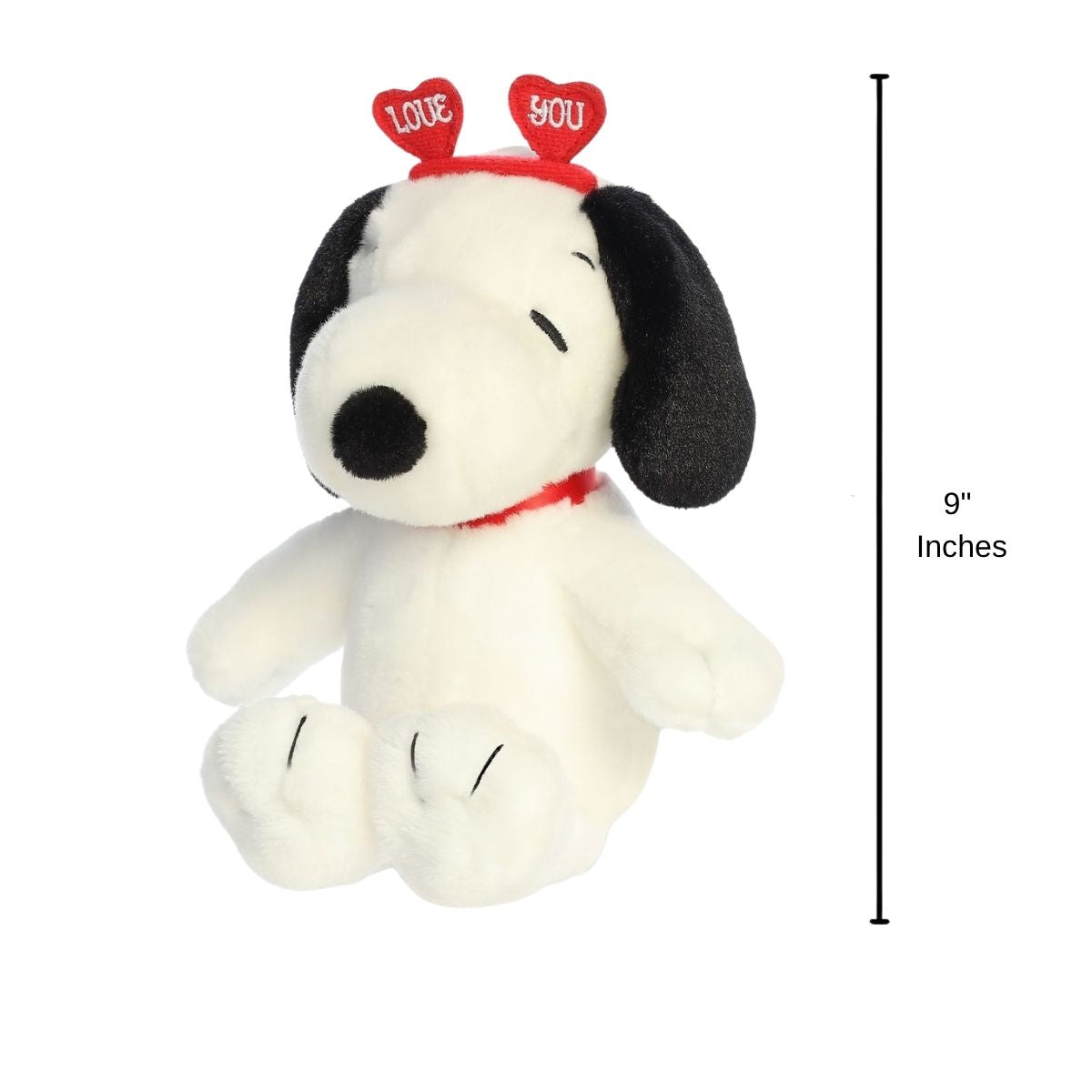 Sizing graphic for the Aurora Peanuts Snoopy plush sitting upright, indicating a total height of 9 inches.