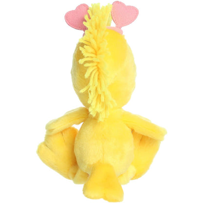 Rear thumbnail view of the Aurora Woodstock stuffed toy showing its spiky yellow plumage and the back of its pink heart headband.