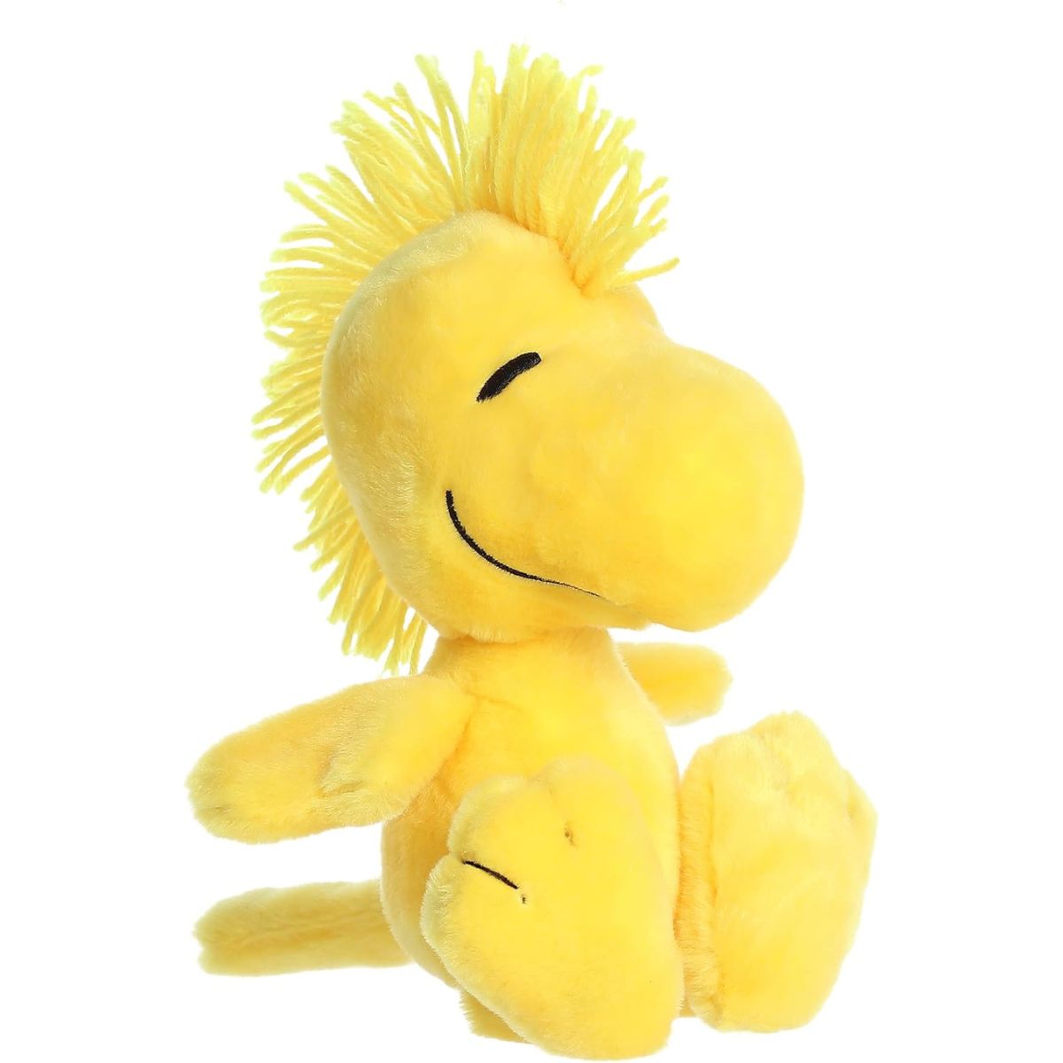 Front angled view of the 6.5-inch Aurora Peanuts Floppy Woodstock plush toy featuring bright yellow fur and a fuzzy tuft of hair.