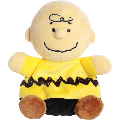Front view thumbnail of the cute Charlie Brown plush sitting straight, showcasing his round bald head, forehead hair curl, and outstretched yellow arms.