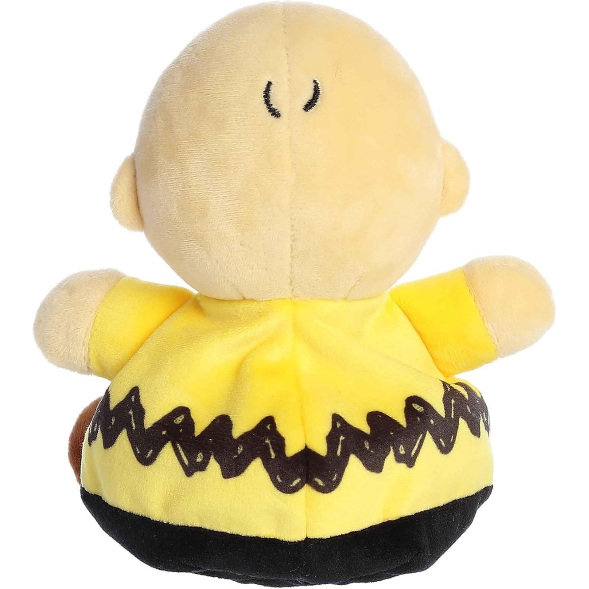 Rear thumbnail view of the Aurora Charlie Brown stuffed toy displaying his yellow shirt with the continuous black zig-zag pattern and tiny hairs on the back of his head.